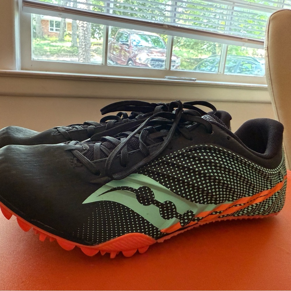 Saucony Black and Mint Track Shoes with Orange Accents